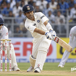 Rahul Dravid in India Test jersey playing a classical flick shot during a cricket match
